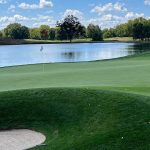Panoramic view of a lush green golf course at Crooked Stick Golf Club. Smooth
