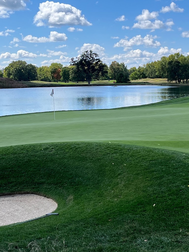 Panoramic view of a lush green golf course at Crooked Stick Golf Club. Smooth