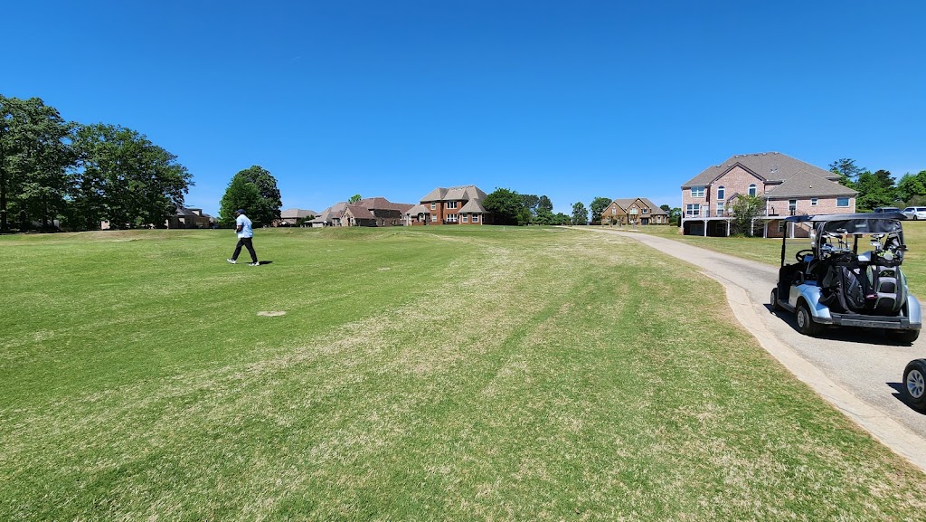 Panoramic view of a lush green golf course at Crystal Lake Golf & Country Club. Smooth