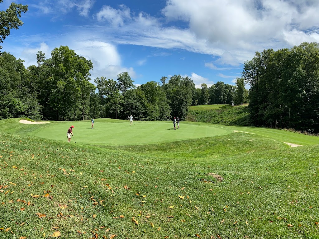 Panoramic view of a lush green golf course at Dale Hollow Lake State Resort Park. Smooth