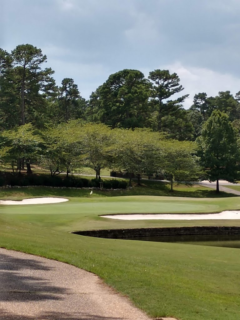 Panoramic view of a lush green golf course at DeSoto Golf Course. Smooth