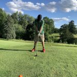 Panoramic view of a lush green golf course at Deer Park Golf Club. Smooth