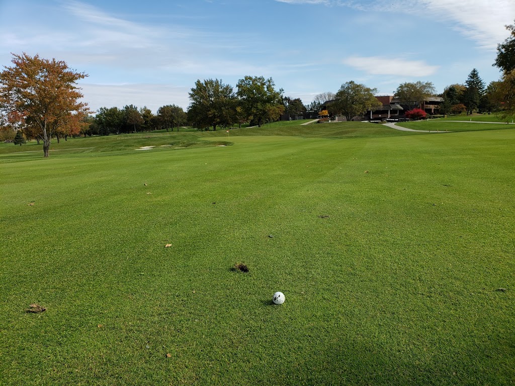 Panoramic view of a lush green golf course at Des Moines Golf and Country Club. Smooth