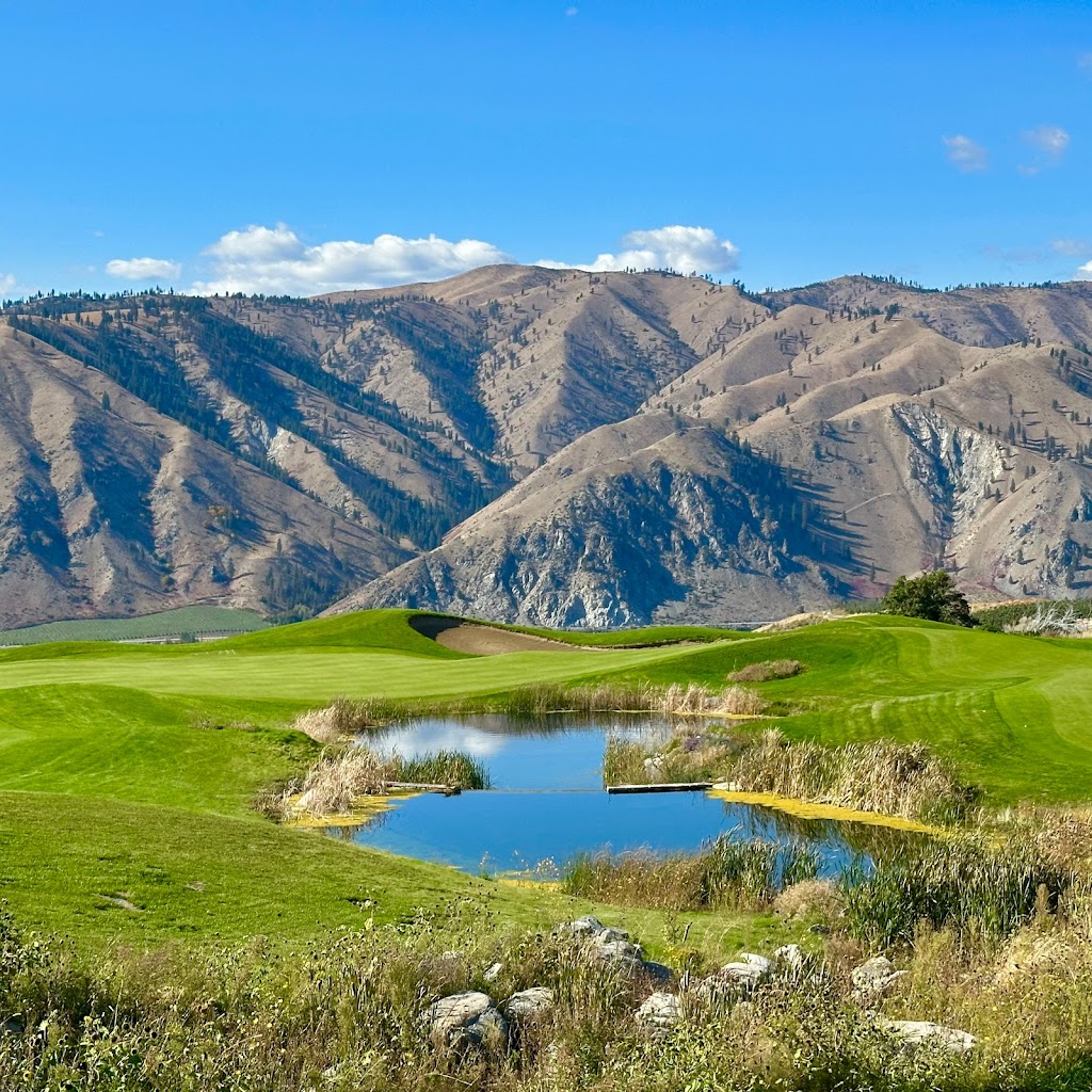 Panoramic view of a lush green golf course at Desert Canyon Golf Resort. Smooth