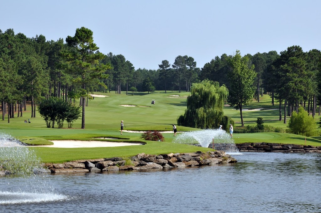 Panoramic view of a lush green golf course at Diamante Country Club. Smooth