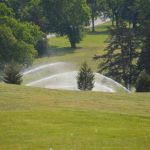 Panoramic view of a lush green golf course at Diamond Hills Country Club & Bunker Grill. Smooth