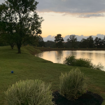 Panoramic view of a lush green golf course at Diamond Links Golf Course. Smooth
