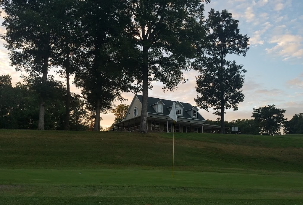 Panoramic view of a lush green golf course at Dixie Oaks Golf Club. Smooth