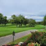 Panoramic view of a lush green golf course at Downingtown Country Club. Smooth
