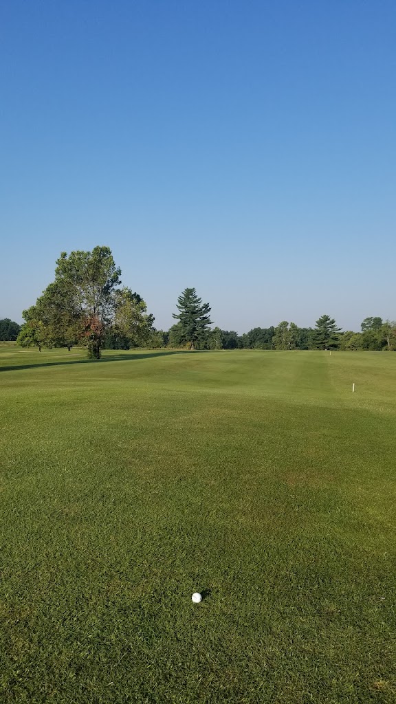 Panoramic view of a lush green golf course at Eagle Creek Golf Course. Smooth