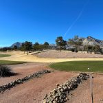 Panoramic view of a lush green golf course at Eagle Crest Golf Course. Smooth