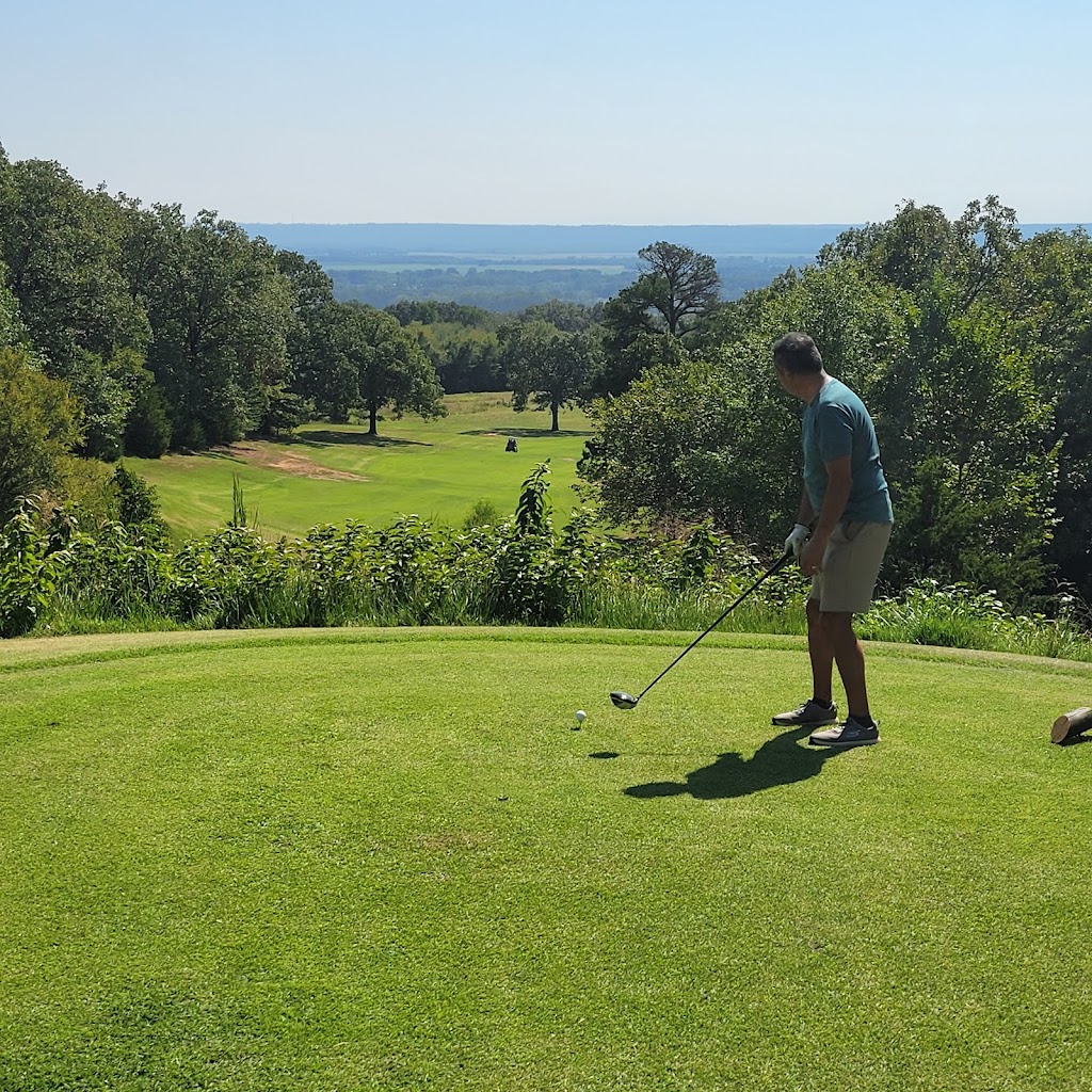 Panoramic view of a lush green golf course at Eagle Crest Golf Course. Smooth
