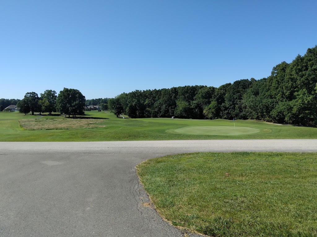 Panoramic view of a lush green golf course at Eagle Trace Golf Course. Smooth