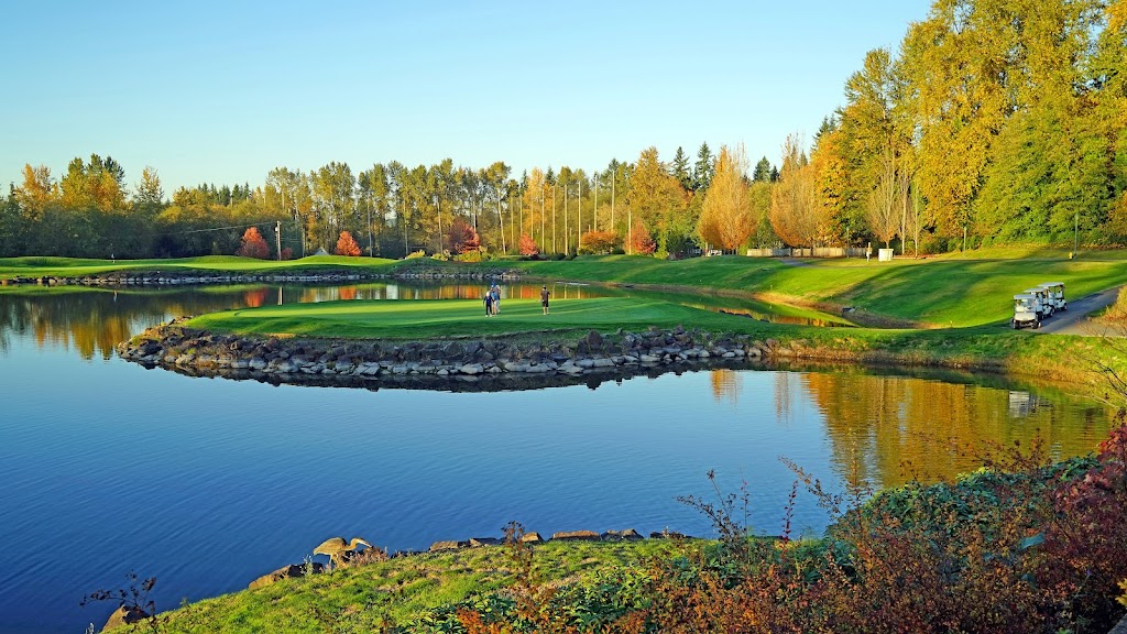 Panoramic view of a lush green golf course at Echo Falls Golf Club. Smooth