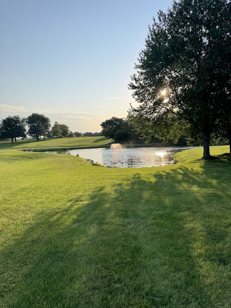 Panoramic view of a lush green golf course at Echo Valley Country Club. Smooth