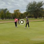 green grass with the flag in the hole.