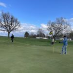Panoramic view of a lush green golf course at Edgebrook Golf Course. Smooth