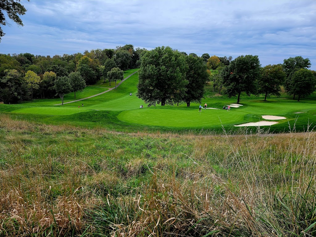 Panoramic view of a lush green golf course at Edgewood Country Club. Smooth