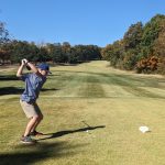 Panoramic view of a lush green golf course at Eldon Golf Club. Smooth