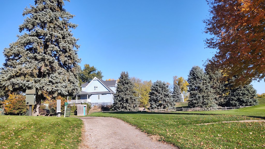 Panoramic view of a lush green golf course at Elkhorn Valley Golf Club. Smooth