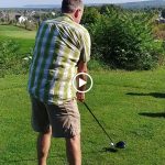 green grass with the flag in the hole.