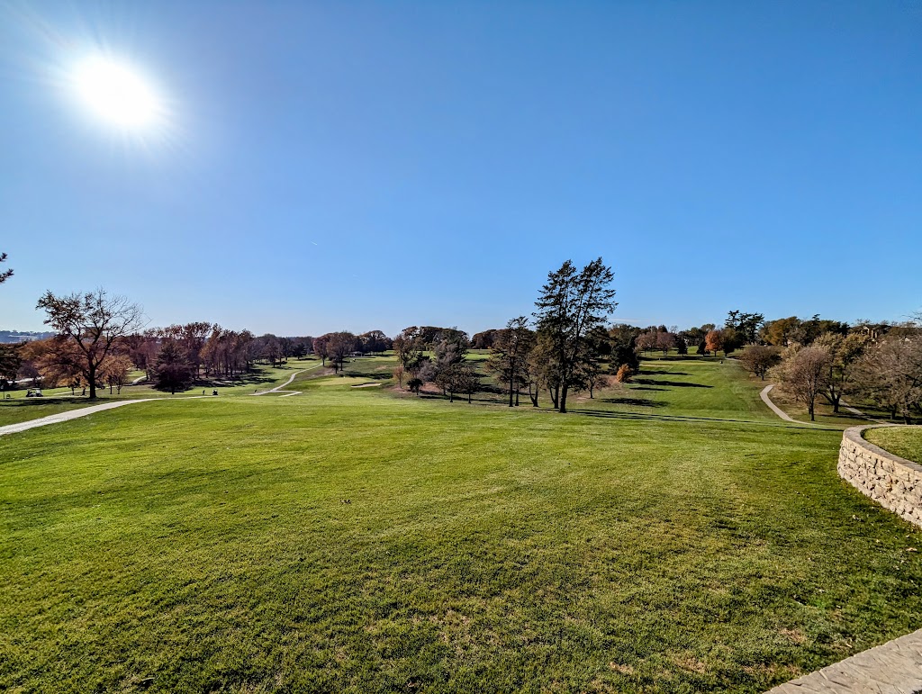 Panoramic view of a lush green golf course at Elmwood 18 Hole Golf Course. Smooth