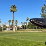 Panoramic view of a lush green golf course at Encanto 9-Hole Golf Course. Smooth