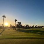 Panoramic view of a lush green golf course at Encanto 9-Hole Golf Course. Smooth
