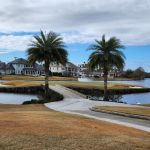 Panoramic view of a lush green golf course at English Turn Golf & Country Club. Smooth