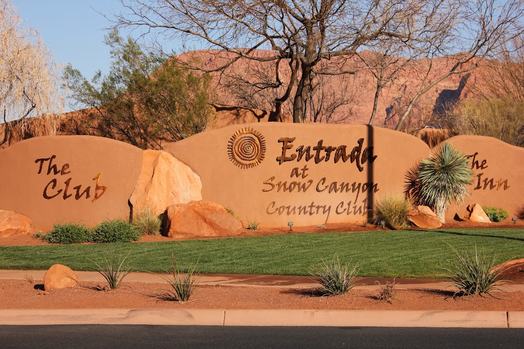 Panoramic view of a lush green golf course at Entrada At Snow Canyon Country Club. Smooth