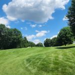 Panoramic view of a lush green golf course at Erskine Park Golf Course. Smooth