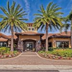Panoramic view of a lush green golf course at Esplanade Golf and Country Club at Lakewood Ranch (Members Only). Smooth