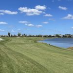 Panoramic view of a lush green golf course at Esplanade at Azario Lakewood Ranch Golf Course. Smooth