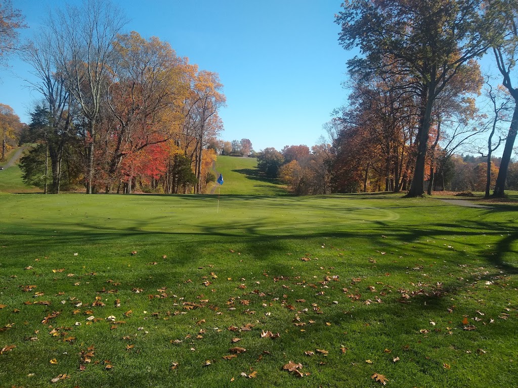 Panoramic view of a lush green golf course at Fairchild Wheeler Golf Course. Smooth