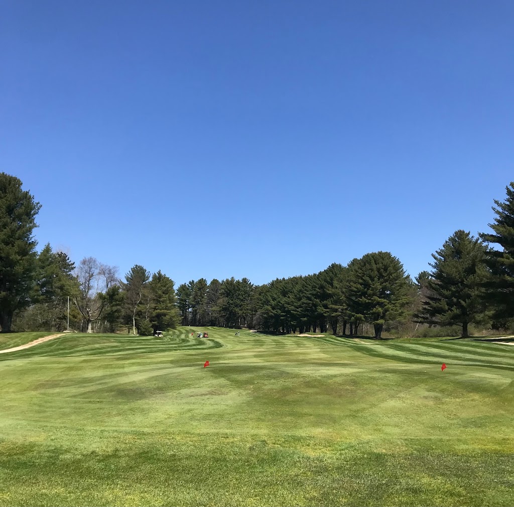 Panoramic view of a lush green golf course at Fairlawn Golf Course. Smooth
