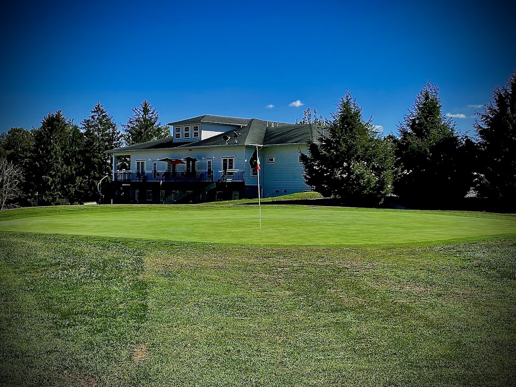 Panoramic view of a lush green golf course at Fairmont Field Club. Smooth