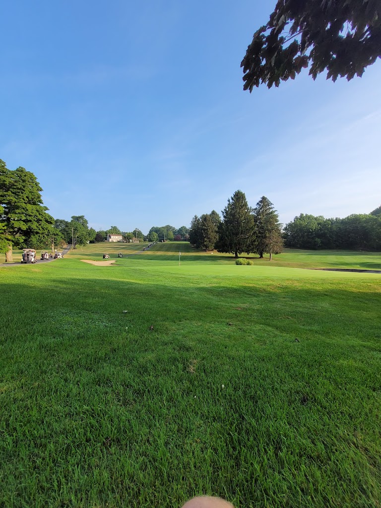 Panoramic view of a lush green golf course at Fairview Golf Course. Smooth