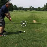green grass with the flag in the hole.