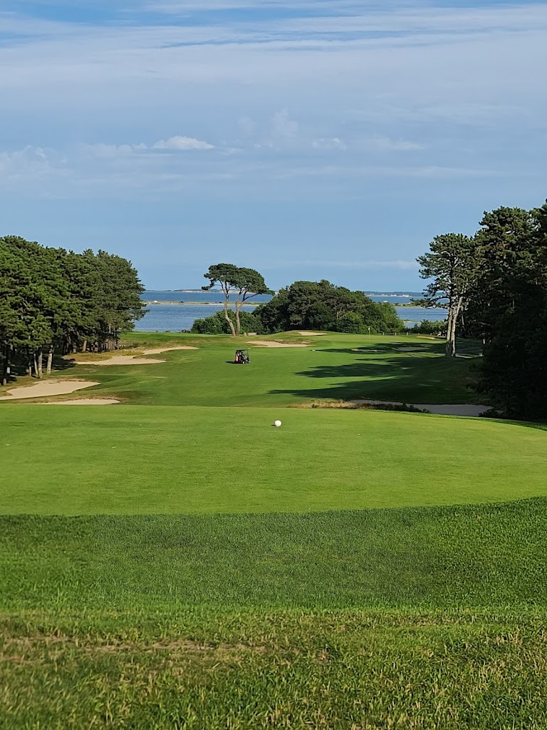 Panoramic view of a lush green golf course at Farm Neck Golf Club. Smooth