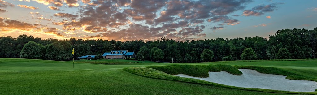 Panoramic view of a lush green golf course at FarmLinks at Pursell Farms. Smooth