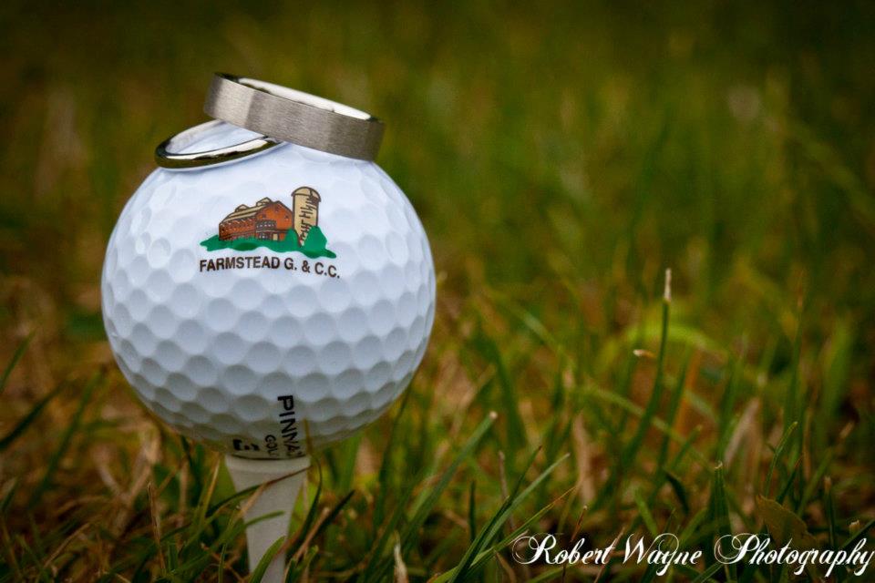 Panoramic view of a lush green golf course at Farmstead Golf & Country Club. Smooth