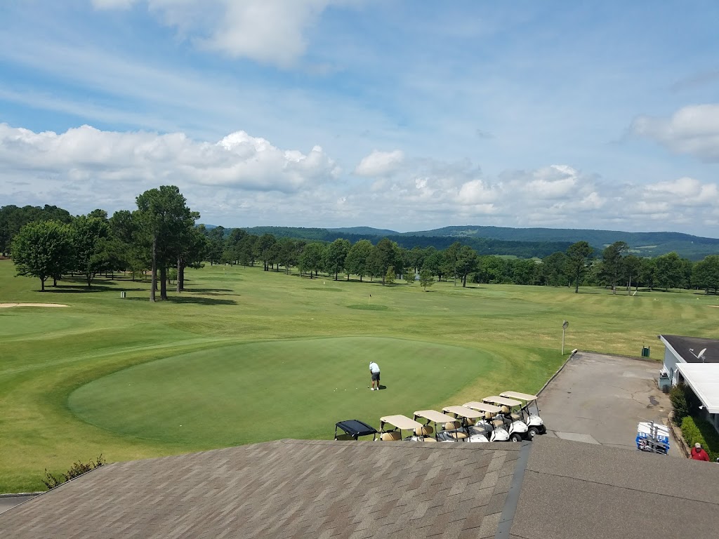 Panoramic view of a lush green golf course at Fayetteville Country Club. Smooth