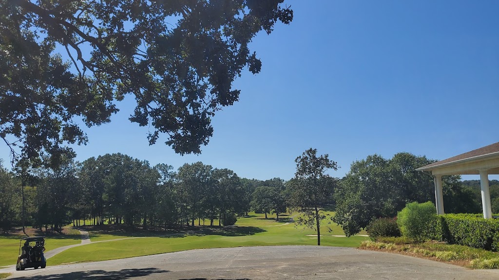 Panoramic view of a lush green golf course at Fields Ferry Golf Club. Smooth