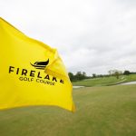 Panoramic view of a lush green golf course at FireLake Golf Course. Smooth