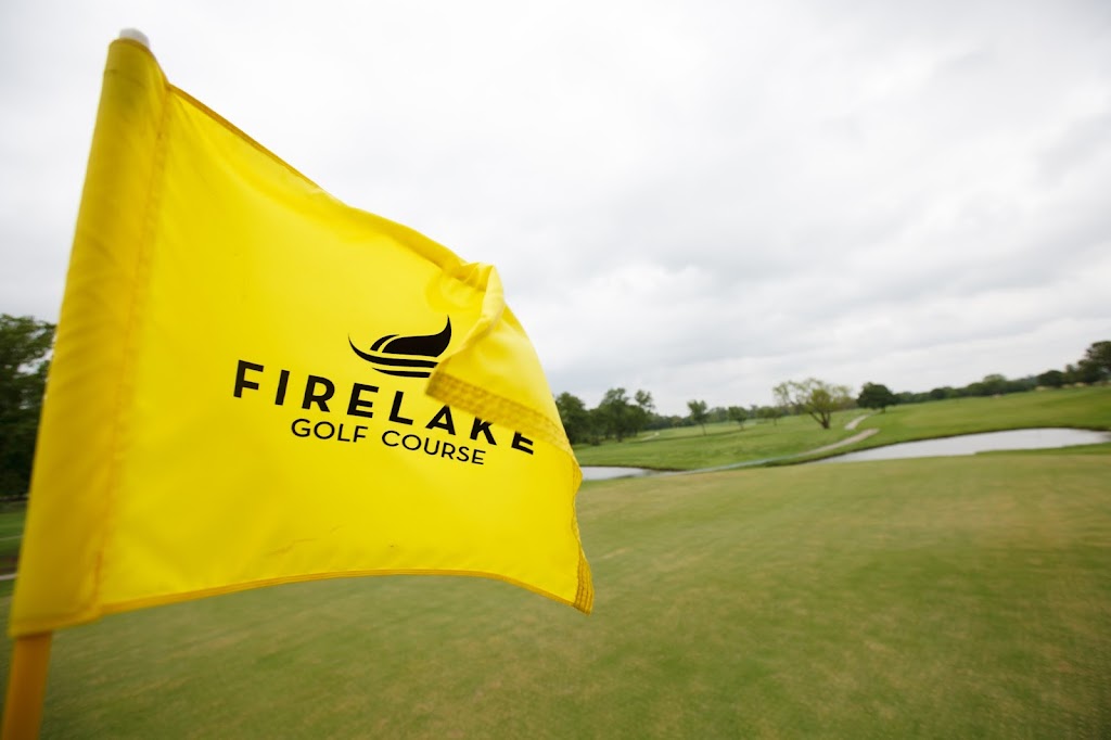 Panoramic view of a lush green golf course at FireLake Golf Course. Smooth