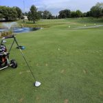 Panoramic view of a lush green golf course at Flagg Creek Golf Course. Smooth