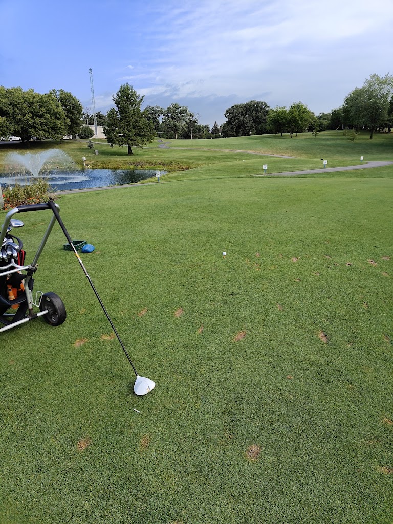 Panoramic view of a lush green golf course at Flagg Creek Golf Course. Smooth