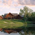 Panoramic view of a lush green golf course at Flint Hills National Golf Club. Smooth