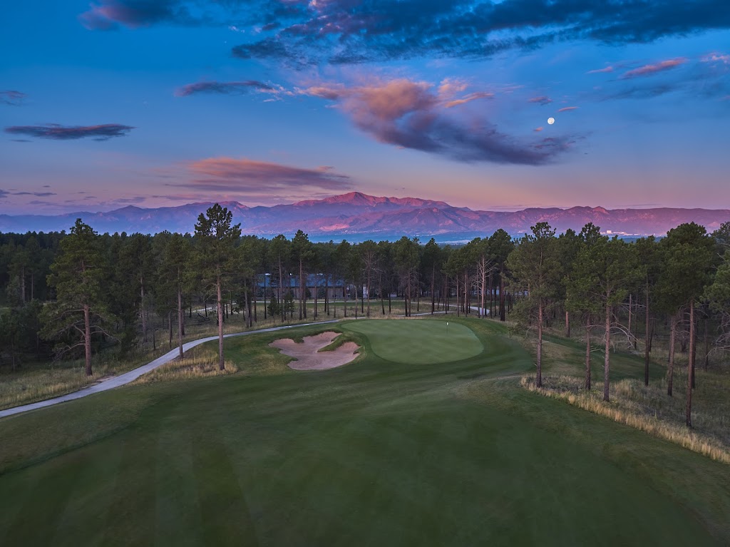Panoramic view of a lush green golf course at Flying Horse North Golf Course. Smooth
