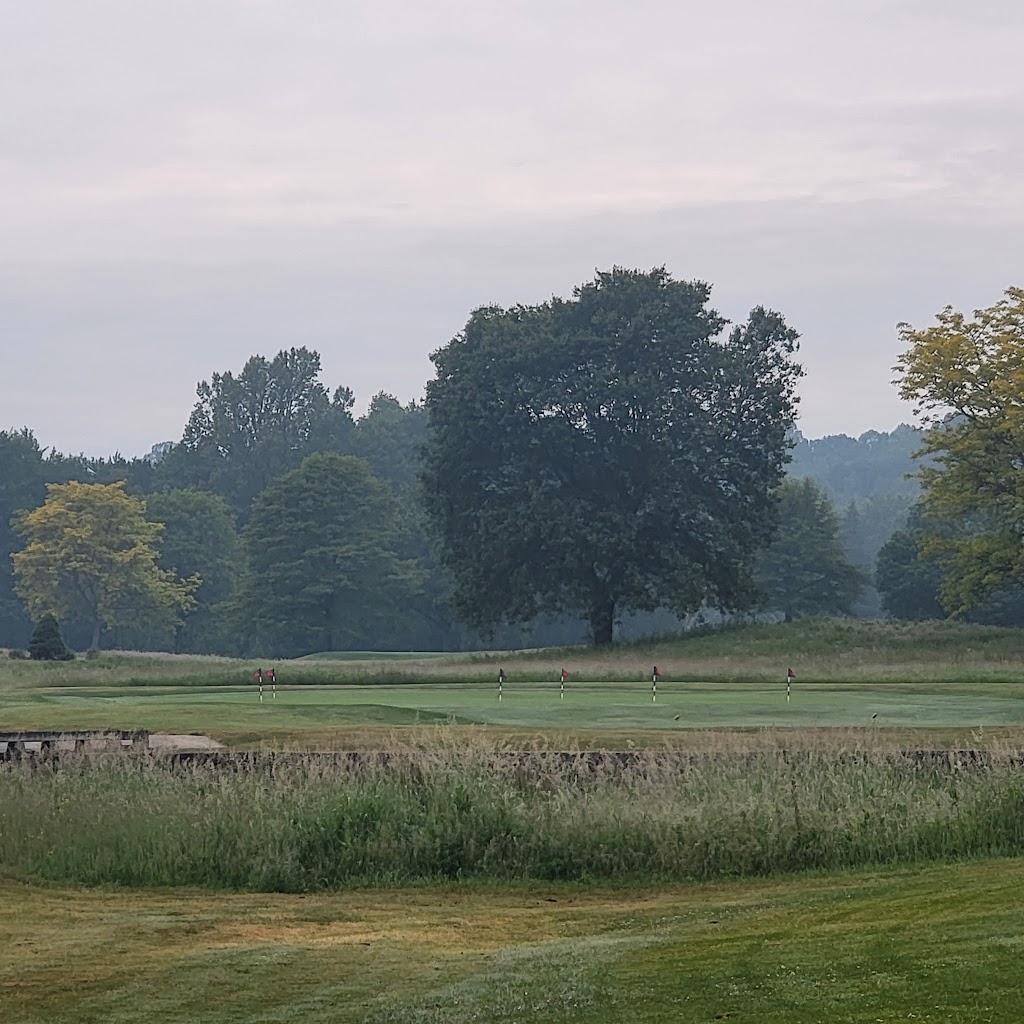 Panoramic view of a lush green golf course at Fowler's Mill Golf Course. Smooth